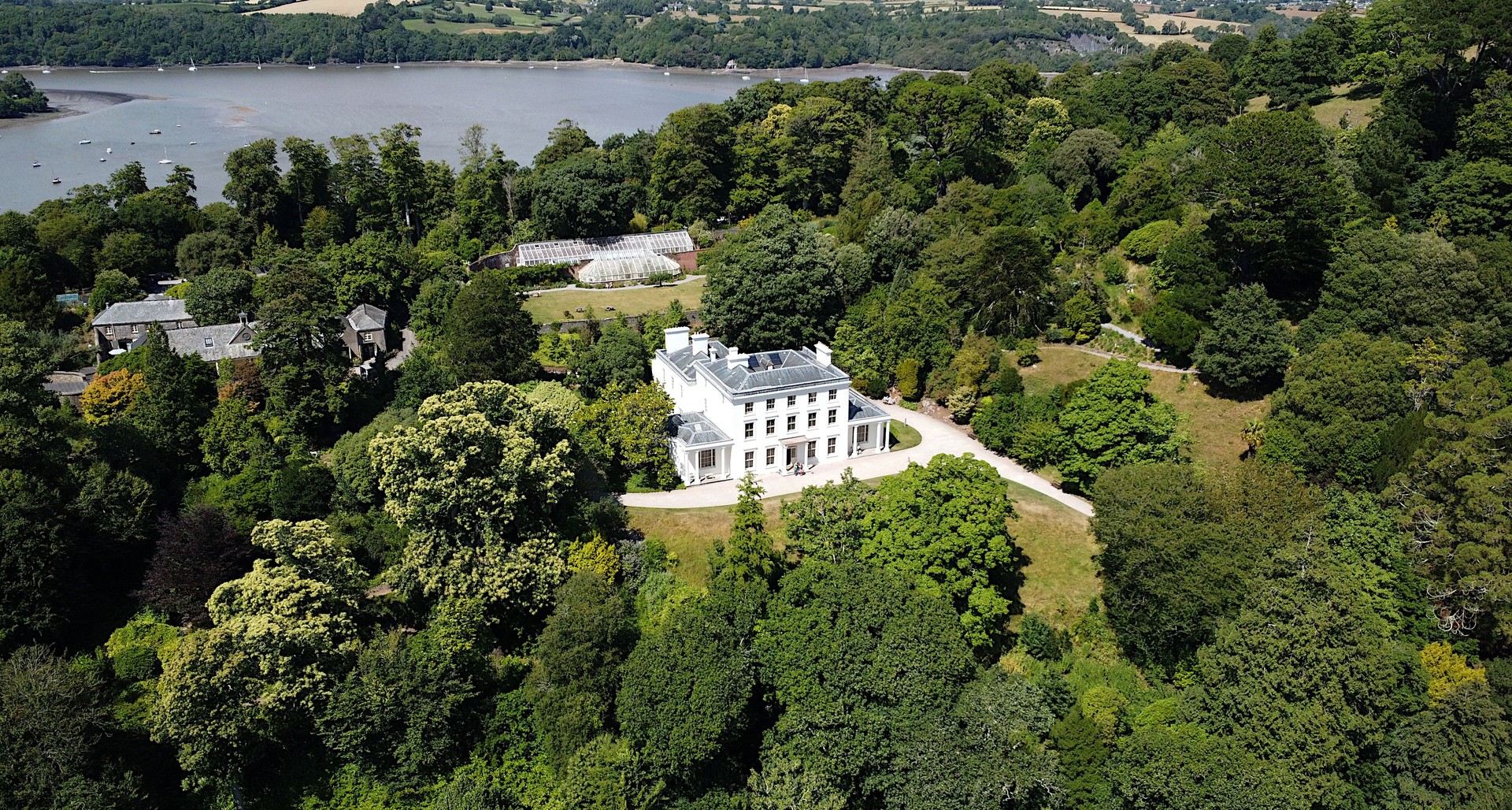 Greenway, River Dart, South Devon, England: DRONE VIEW: Greenway House overlooking the River Dart